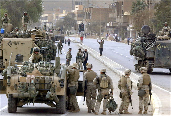 America's imperial march into Baghdad, April 9, 2003.